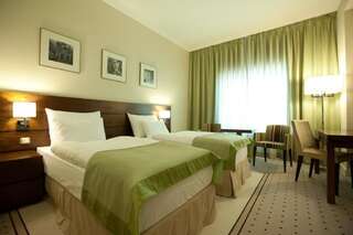 Отель Capital Plaza Hotel Бухарест Стандартный двухместный номер с 1 кроватью или 2 отдельными кроватями-6