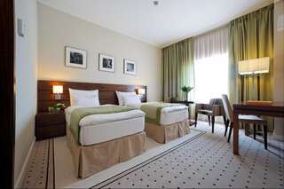 Отель Capital Plaza Hotel Бухарест Стандартный двухместный номер с 1 кроватью или 2 отдельными кроватями-8