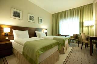 Отель Capital Plaza Hotel Бухарест Стандартный двухместный номер с 1 кроватью или 2 отдельными кроватями-2